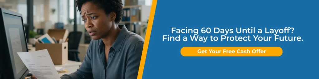 Worried employee reviews paperwork at work as a WARN Act Oregon layoff notice prompts planning ahead and exploring cash offers.
